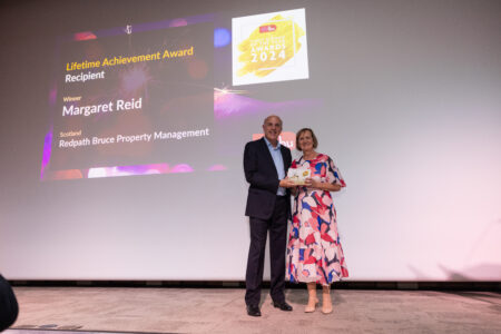 Image shows Margaret Reid receiving her Family Business of the Year Lifetime Achievement Award.